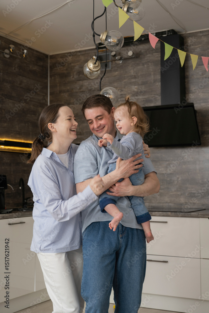 Family spending joyful time together in the kitchen at home Family spending joyful time together in the kitchen at home