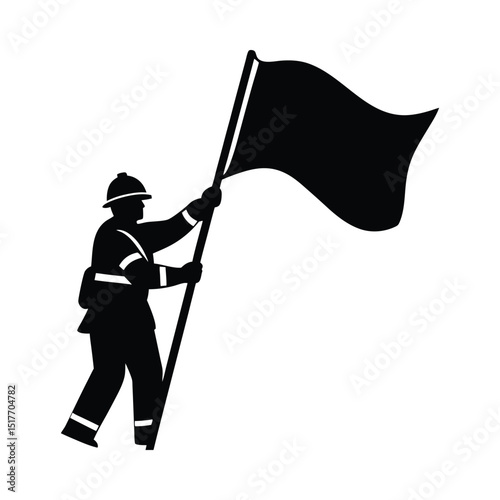 Silhouette of a firefighter carrying a flag