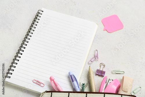 Open spiral notebook with b...