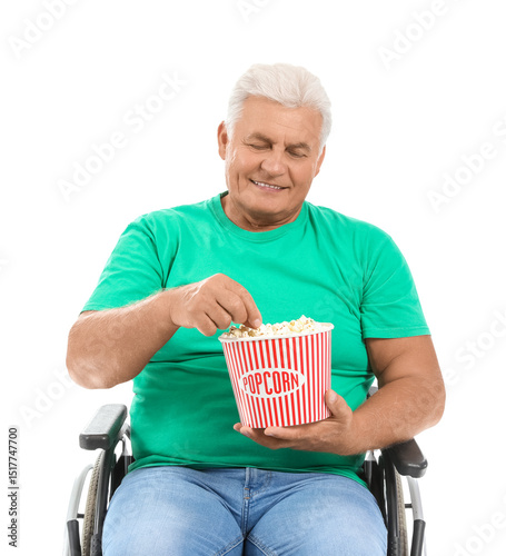 Mature man in wheelchair ea...
