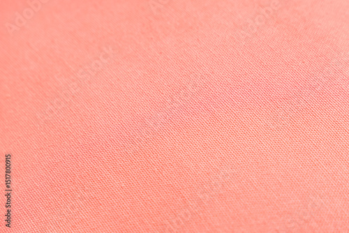 Texture of coral fabric as background, closeup