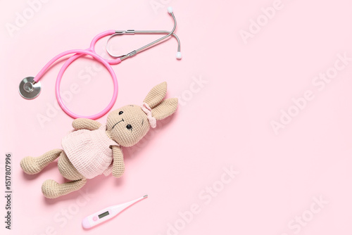 Toy rabbit with thermometer...
