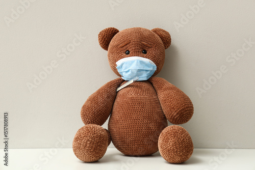 Teddy bear in medical mask ...