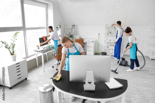 Female janitor cleaning des...
