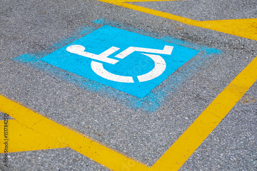 Fototapeta Naklejka Na Ścianę i Meble -  EV charging station parking, blue marked space, electric vehicle infrastructure, green transport, eco-friendly parking lot, electric mobility, zero emission, alternative energy, eco car