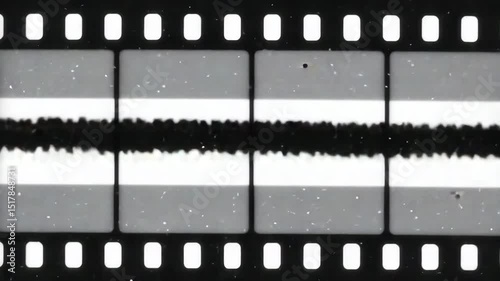 Distressed black-and-white 8mm film with dust and flicker	