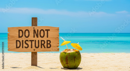 Enjoying a tranquil moment at the beach with a refreshing coconut drink and a do not disturb sign