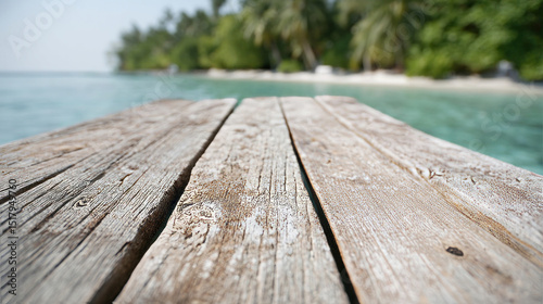 Weathered wooden pier stretches invitingly towards turquoise serenity, evoking escapism and tranquility, perfect for Global Wellness Day musings