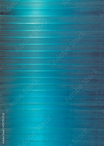 Grunge blue metallic background with horizontal stripes, detail of an industrial wall 
