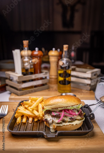 Delicious burger with french fries