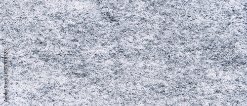 Grey felt material. Surface of felted fabric texture abstract background in gray color.