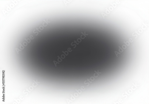 Dark circular shape on white background with blurred edges creating a soft effect.