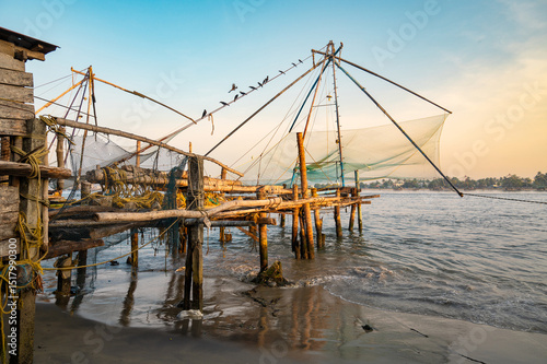 Photos Chinese fishing nets on the shore of Kochi, Kerala in India, Cheenavala or tangk