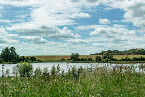 Countryside landscape with sky and fields, real life photo