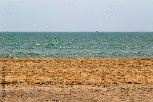 Serene Beach with Golden Sand and Blue Sea, Cox's Bazar, Bay of Bengal, Bangladesh