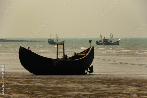 Fototapeta traditional fishing boats, sampan, on the beach