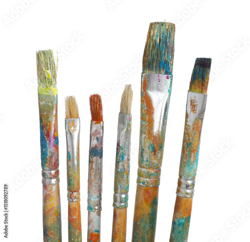 Fototapeta Naklejka Na Ścianę i Meble -  Brushes with different paints isolated on white