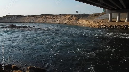 Spillway channel into the sea. October 20224 year. Kazakhstan. Mangistau region.