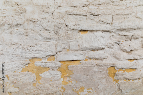 Rough white rendered stone brick wall photo