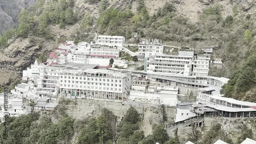 Cinematic footage capturing the spiritual journey and vibrant atmosphere of the Vaishno Devi pilgrimage in Katra, nestled in the scenic Trikuta Mountains of Jammu and Kashmir.