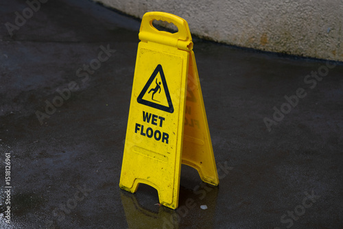 wet floor caution sign photo