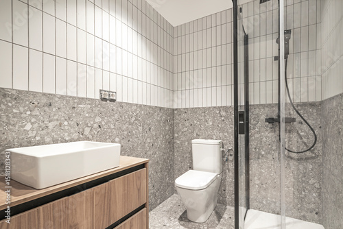 Metals, such as brushed stainless steel or matte black and gold finishes, are used in faucets, accessories,