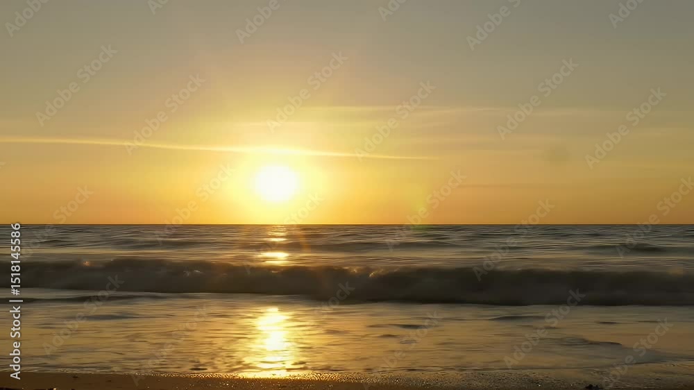 Golden Sunset over Ocean Waves: Serene Beach Landscape Video Footage Golden Sunset over Ocean Waves: Serene Beach Landscape Video Footage