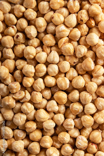 Cuadro en lienzo roasted hazelnuts closeup, shelled nuts background, healthy snack
