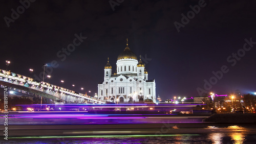 Majestic orthodox Cathedral of Christ Saviour and bridge at dusk on bank of Moscow river. Timelapse hyperlapse, Russia