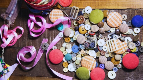This sentence ties together the visual (colorful beads on wood/market), the feel (candy-like appearance), and the tags (decoration, sweet, Easter, jewelry) Let me know if you want a shorter or more pl