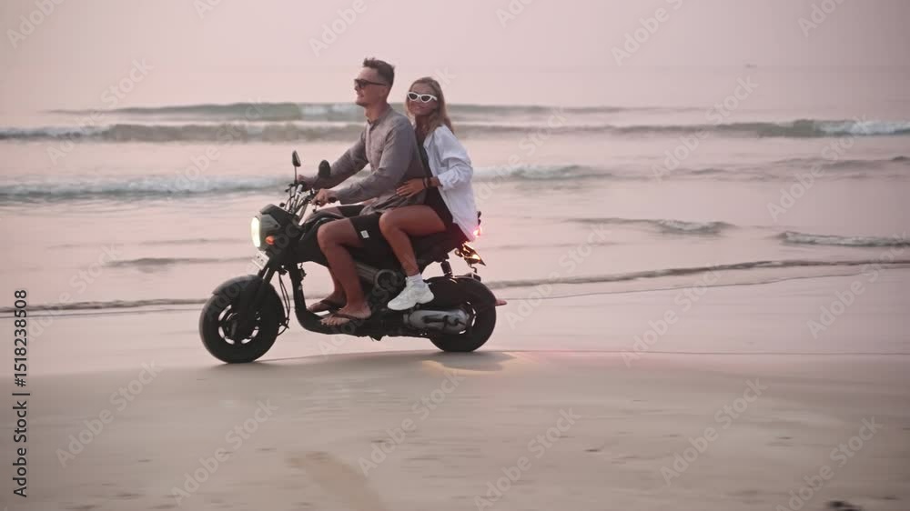 custom made wallpaper toronto digitalTravel couple riding motorbike on ocean sandy beach in tropical paradise at sunset. Man with girlfriend driving motorcycle on coastline shore water edge. Woman enjoys adventure with her lover.