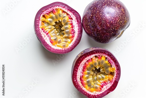 High Definition Visual of Purple Passion Fruit with Cut in Half on White Background