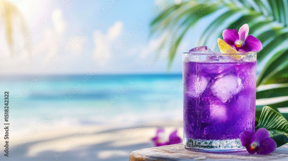 Summery purple cocktail glowing in sunlight with flower accents near sandy beachside Summery purple cocktail glowing in sunlight with flower accents near sandy beachside