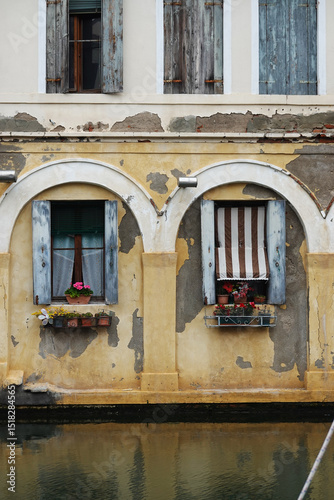 Fototapeta Naklejka Na Ścianę i Meble -  Old canals and streets in Chioggia, Italy