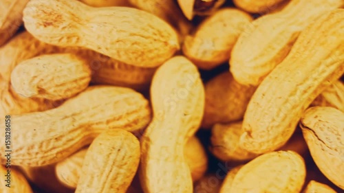 Waviness effect of Peanuts with bark on a retro tray. Peanuts cleaned in the background. Slider shooting