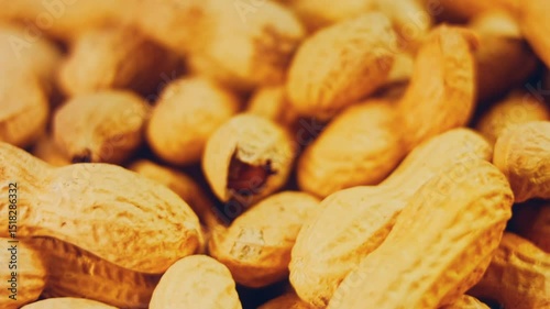 Waviness effect of Peanuts with bark on a retro tray. Peanuts cleaned in the background. Slider shooting