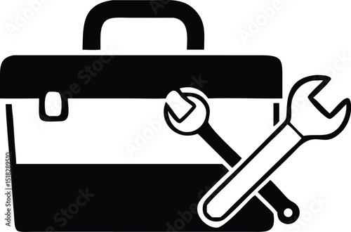 Black and White Icon Toolbox with Handle and Two Wrenches in Front of It