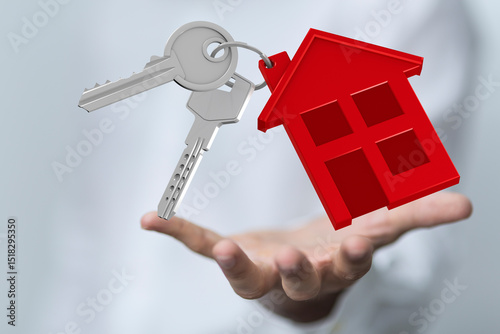 Принти на полотні Image of house keys and a red house icon, symbolizing homeownership and real estate