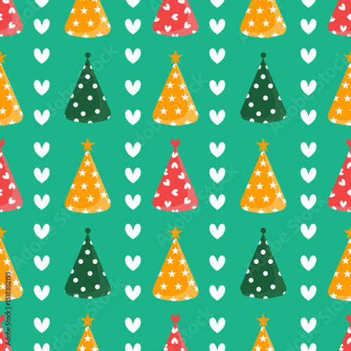 Colorful party hats on a green background.