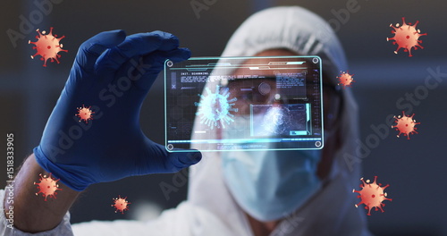 Image of orange virus cells over caucasian male lab worker in safety clothes with digital card