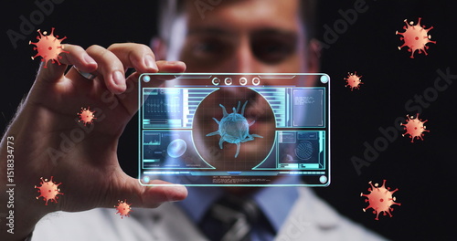 Image of orange virus cells over caucasian male lab worker with digital card with virus data