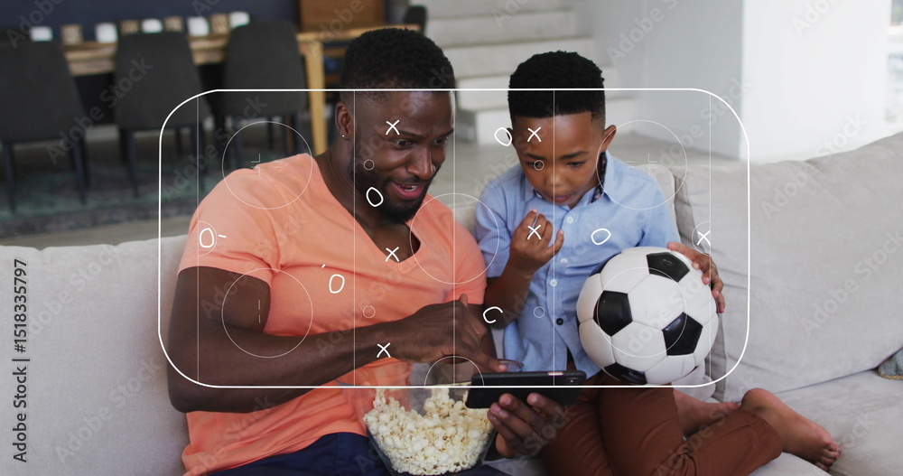 Naklejka premium Image of soccer field over african american father and son watching match in smartphone