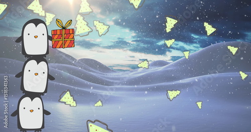 Balancing penguins stacking in snowy hills, with gift box, suitcase holding tree shapes, copy space © vectorfusionart
