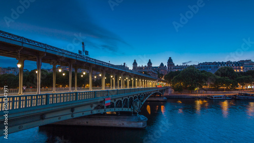 View of pont de Bir-Hakeim day to night timelapse - a bridge that crosses the Seine River. Paris, France