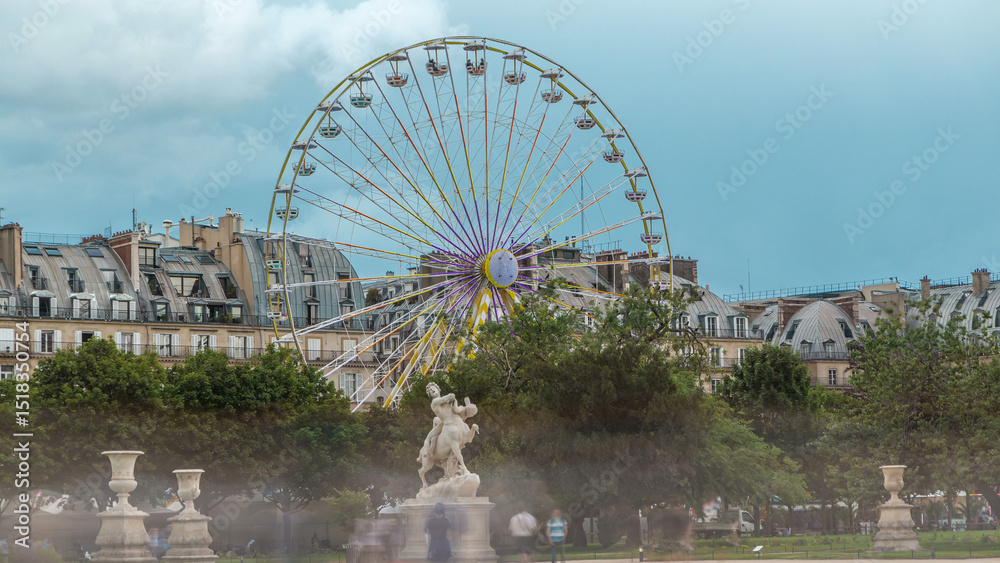 Fototapeta premium Ferris wheel Roue de Paris on Tuileries Garden timelapse. Paris, France.