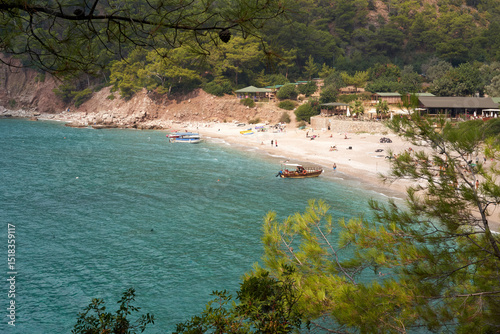 Fototapeta Naklejka Na Ścianę i Meble -  10.02.2019 Kabak Beach in Turkey. Scenic coastal beach with turquoise waters and lush greenery.