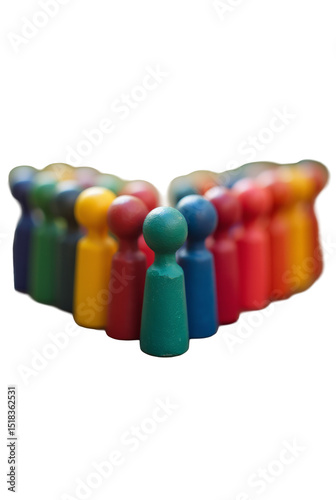 Multicolored Wooden Figurines Arranged in the Shape of a Heart – Multicolored wooden figurines arranged in the shape of a heart on a textured wooden surface.