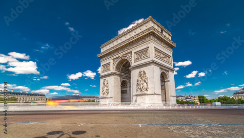 Fototapeta Naklejka Na Ścianę i Meble -  The Arc de Triomphe Triumphal Arch of the Star timelapse hyperlapse is famous monument in Paris