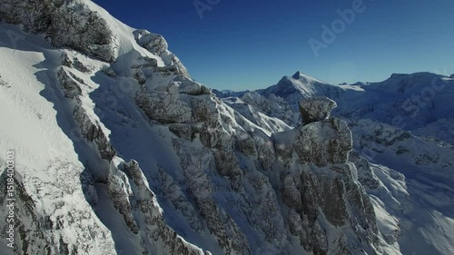Majestic Snow-Capped Peaks against a Blue Winter Sky
