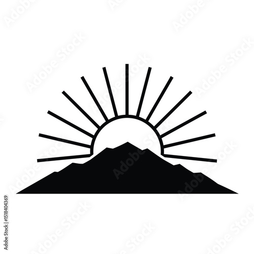 Majestic sunrise over silhouetted mountain peaks